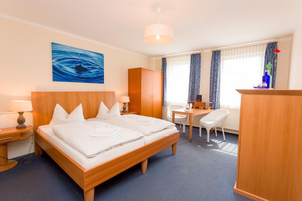 Hotel & Restaurant Am Bodden プットブス 部屋 写真